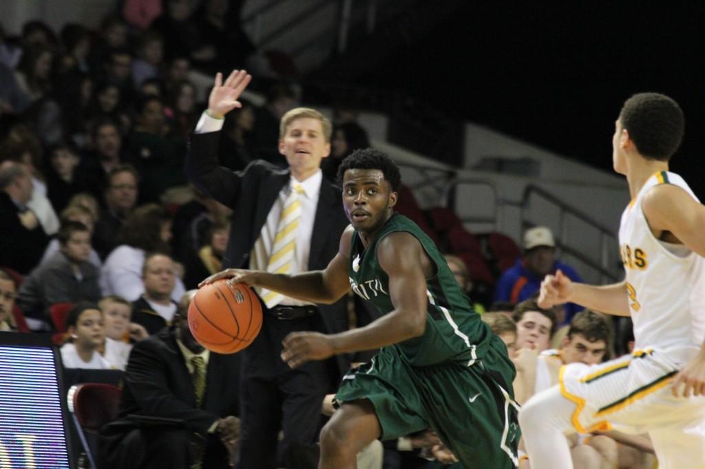 The Rocks' Tre Ivory, shown here in a win against St. Xavier, said of the Rocks' victory in the Seventh Region final: "We played really well against Ballard, and we were fortunate enough to come out with a win. There's no playing this week.  We need to get ready for Owenbsboro."