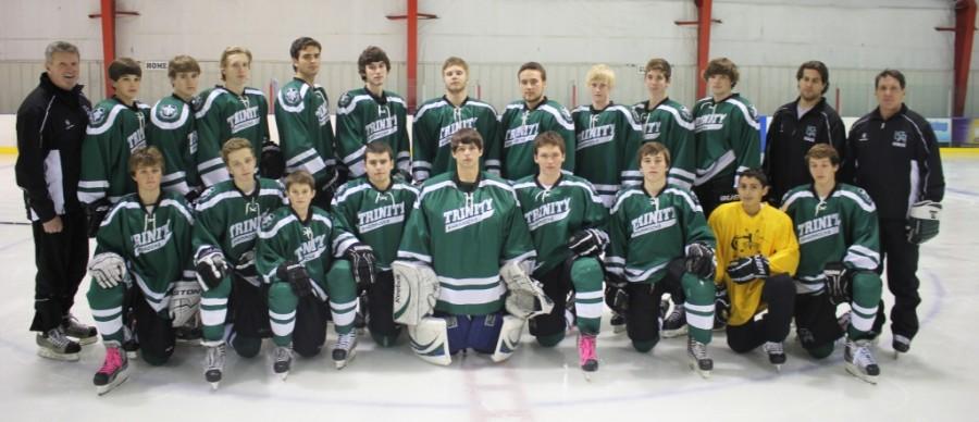 Trinity ice hockey head coach Mark Gustafson (back row, far left) and Ryan Gustafson (back row, fourth from the left) were part of last year's team, which reached the state championship game. 