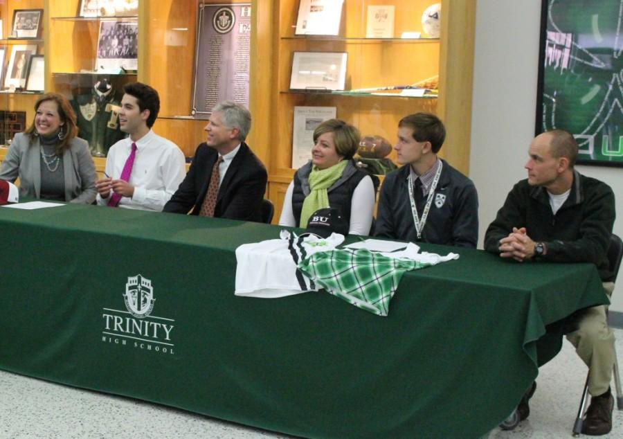 Trinity seniors Jonathan Imperial  and Evan Lang signed national letters of intent after school today in Alumni Hall. Lang signed to run cross country with Bellarmine University, and Imperial will play baseball at the University of Indianapolis.