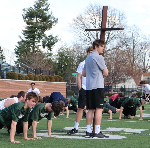 The spring sports teams took part in a Stations of the Cross workout this past Friday afternoon inside Trinitys Marshall Stadium. 