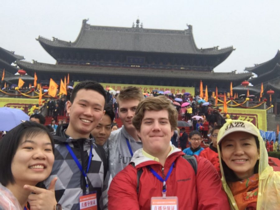 Trinity+students+Aaron+Reilly+and+Jerald+Oliver%2C+along+with+teacher+Mrs.+Jocelyn+Shi%2C+are+in+China+during+spring+break.+