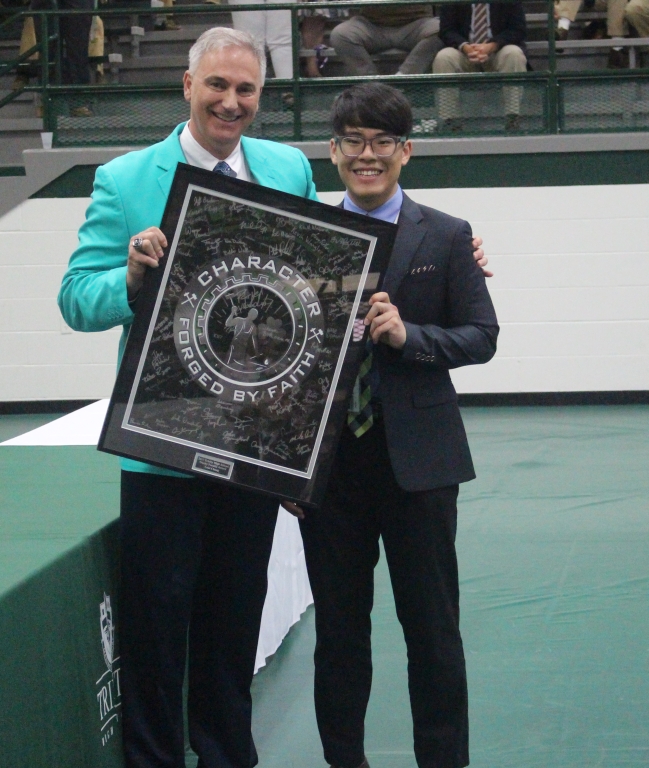 Senior Loui Chang received the Trinity Faculty Award at the 61st annual awards assembly. The award was presented by Dr. Aaron Striegel, Senate President.