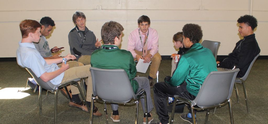A small-group talk during the fall sports ministry retreat.