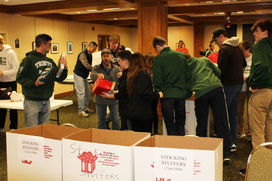 The Rocks made their annual trip to the Wayside Mission Christmas store to help set up. 