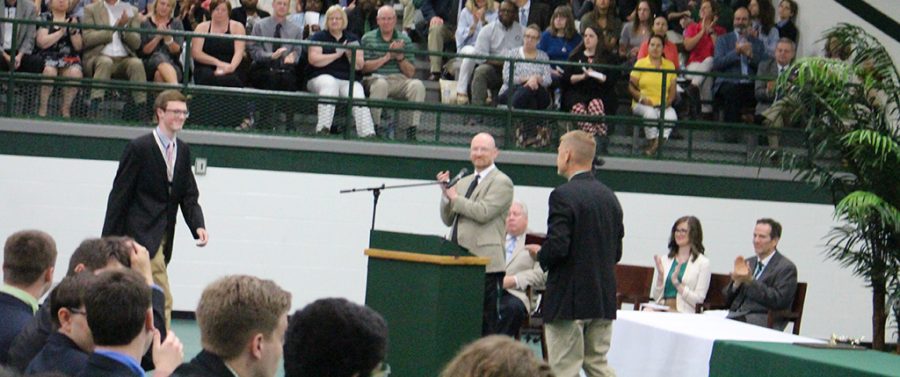 A. J. Hawes receives the Fr. Kevin Caster Service Award from Mr. Joey Porter, Social Media Liaison.