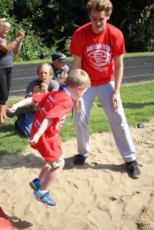 Rocks Cheer On Young Olympians