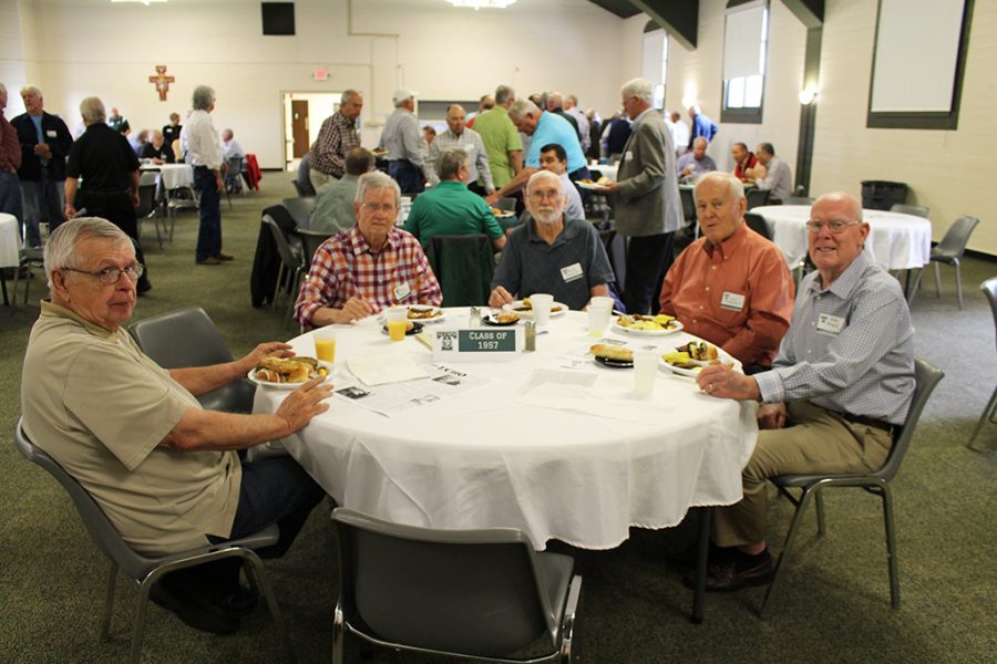 Graduates from 1957,  Trinity's first senior class, attended the annual Emerald Society Brunch. 