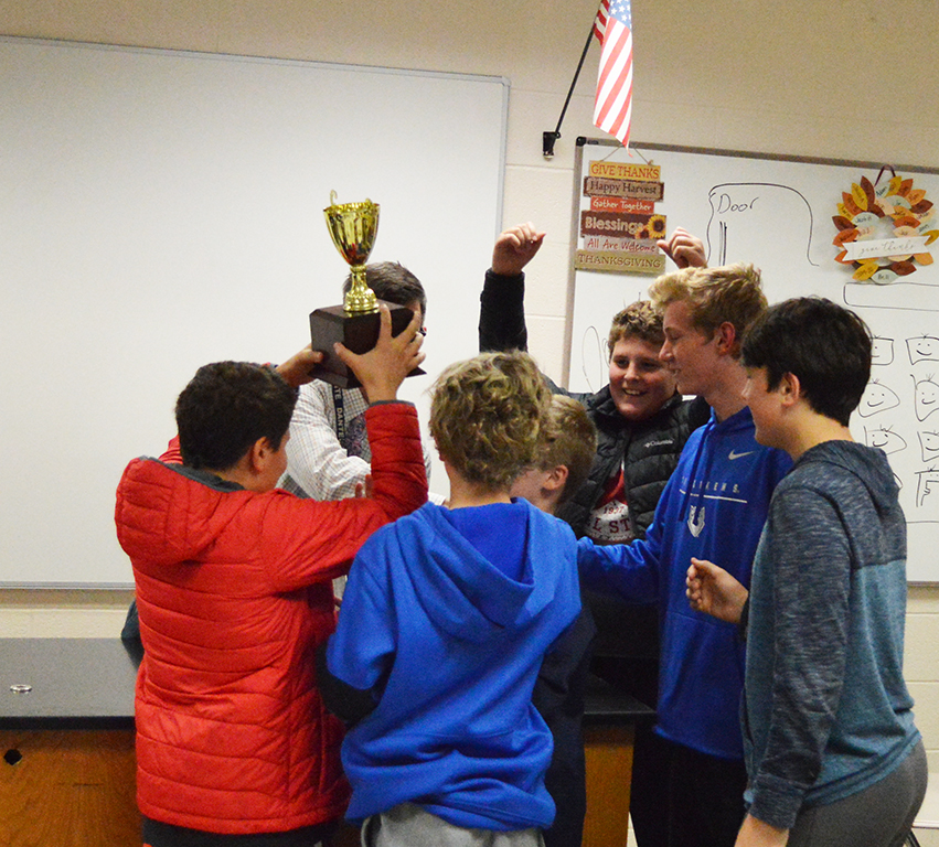 Holy Spirit celebrates after winning the annual Trinity Quick Recall Tournament. 