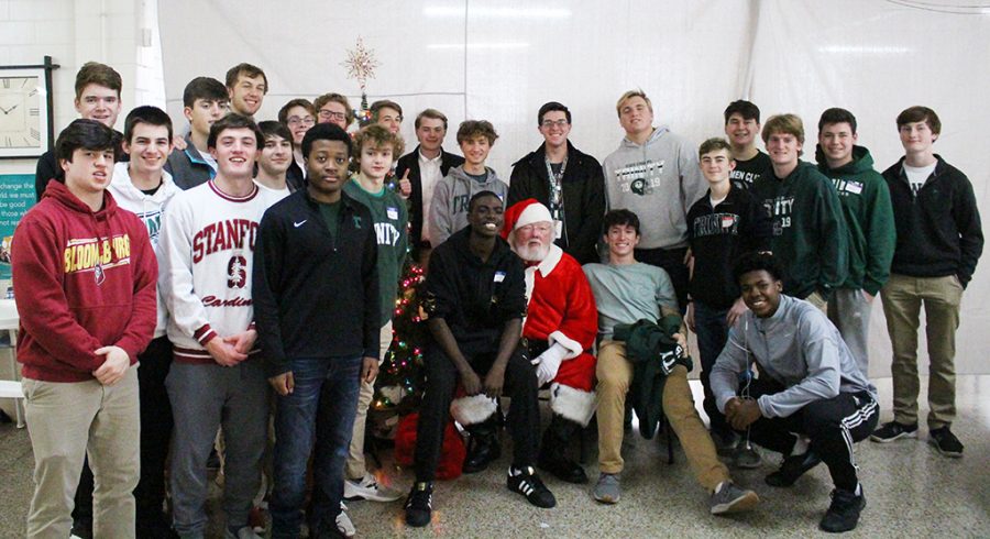 Trinity delivered gifts and  enjoyed a Christmas party with Community Cathlolic on Dec. 15.