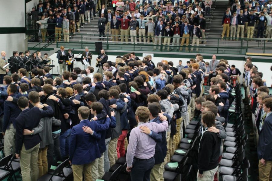 Rocks sing the Alma Mater at the end of Mass on Nov. 26.