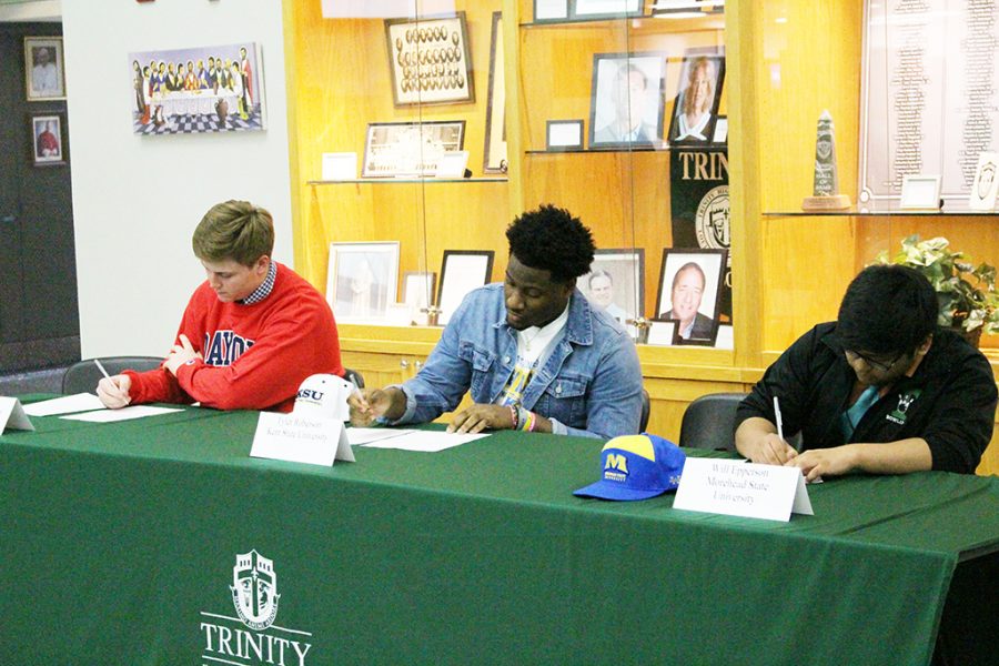 Sam Lewis, Tyler Roberson and Will Epperson sign to play their sports on the collegiate level. 