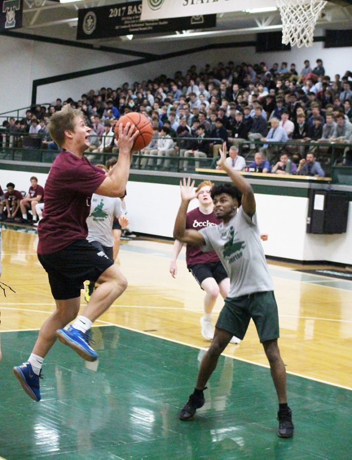 Merton and Becket battled for the House  Intramural Basketball Championship. 