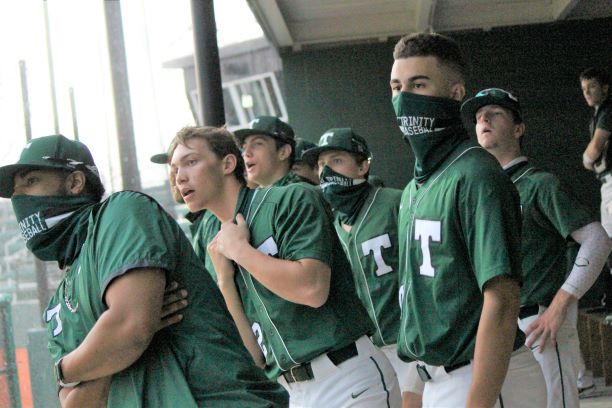 The Rocks react to play during a game against Jeffersonville at home on Apr. 7.  The teams got in some game time before the rain came. 
