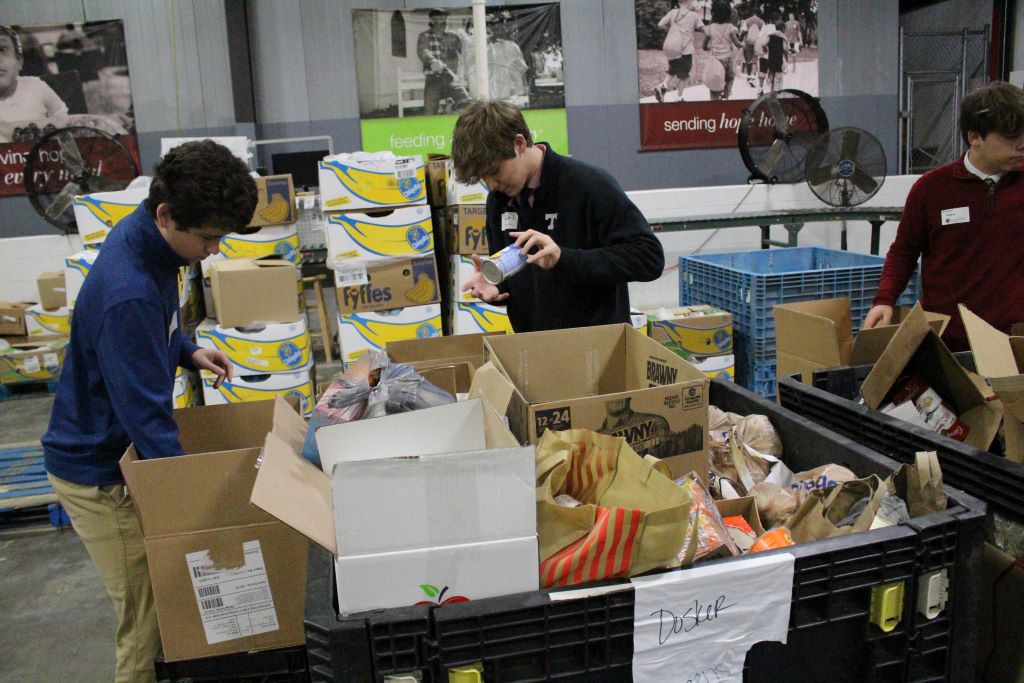 Rocks Lend a Hand at Dare to Care Food Bank Center
