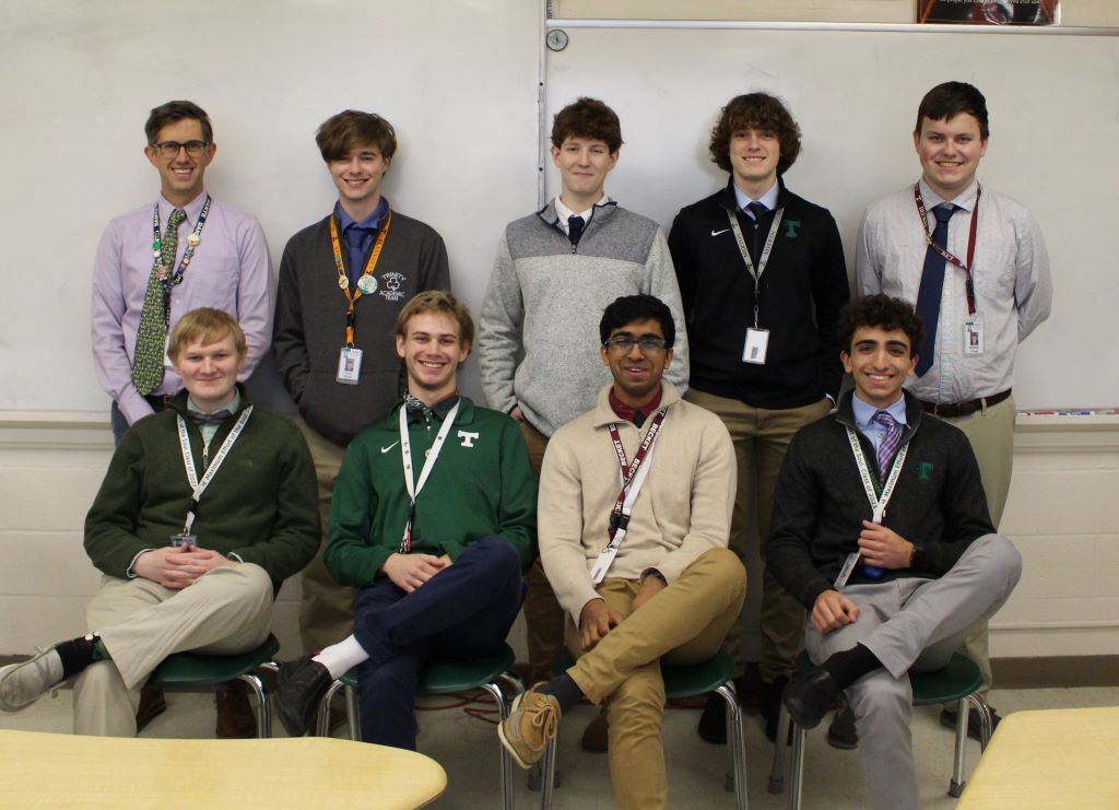 Trinitys varsity academic team with head coach Mr. Mark Amick