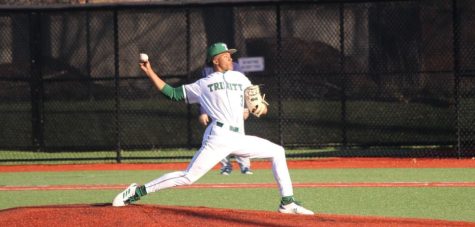 Senior Cam Warfield fires the ball for the 3-0 Rocks. 